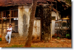 kadamattom_cemetery_kerala_002 * An old hearse (right most) near the Cemetery at Kadamattom, Kerala, India